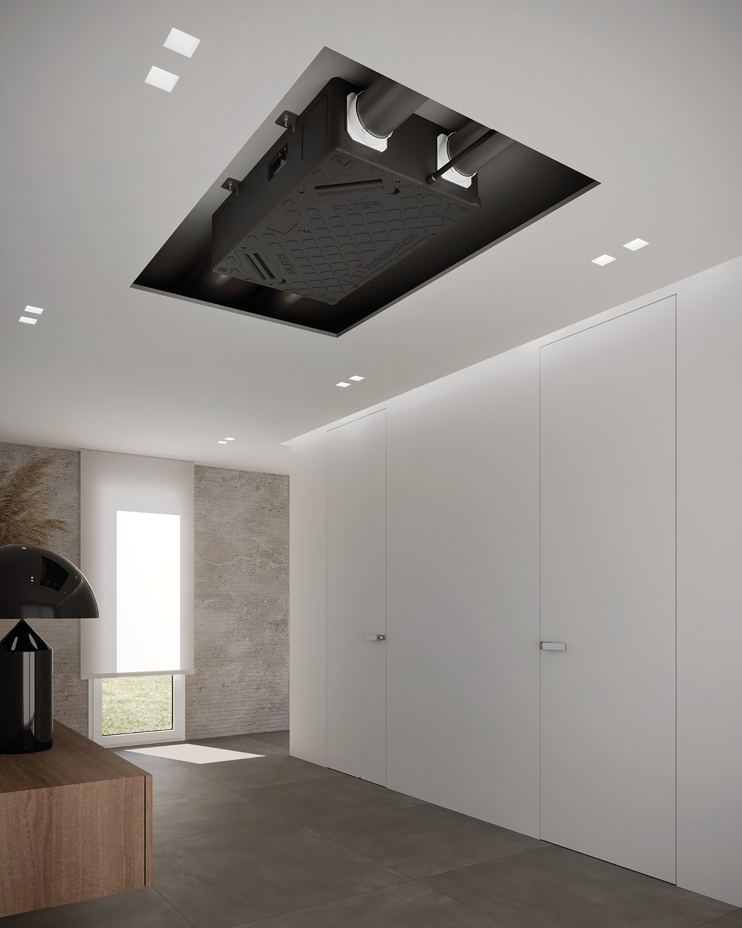 unità di ventilazione nera installata a soffitto in ambiente residenziale moderno